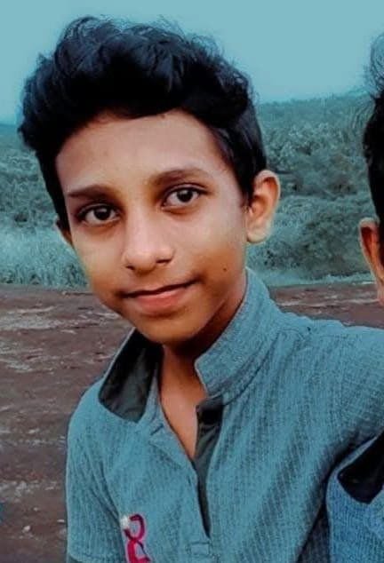 Mother supporting her son’s education, holding books, asking for help with IAL exam and school fees.