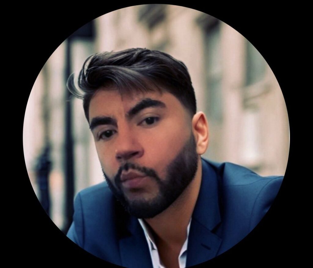 A distressed adult man sitting indoors with his head in his hands, conveying emotional exhaustion and crisis, representing a family in urgent need of compassion and support.